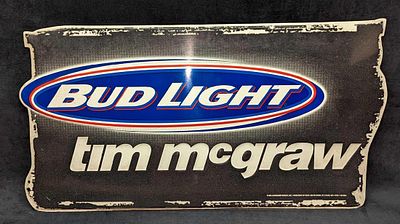 Tim McGraw Bud Light Metal Sign. This is approx 28" x 15 1/4" and it weighs1.10lb. There are 