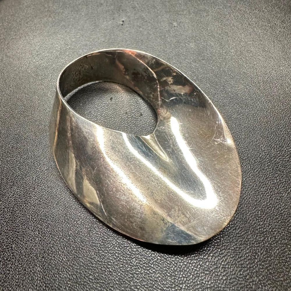 Sterling Silver Mobius Strip Design Brooch. This piece of jewelry has been tested and researched 
