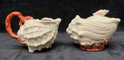 Fitz & Floyd Coral Shells Creamer And Sugar Set. This lot contains a Fitz &amp; Floyd Coral 