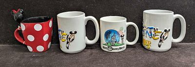 Disney Cruise Line Minnie Mouse And Disney World Mugs. This lot contains: 
(1) Disney Magic 