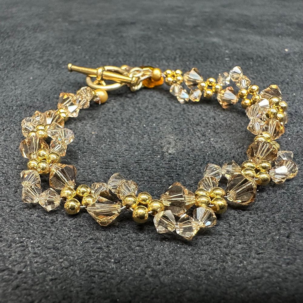 Lot 460: Glass Beaded and Gold Plated Sterling Silver Bracelet