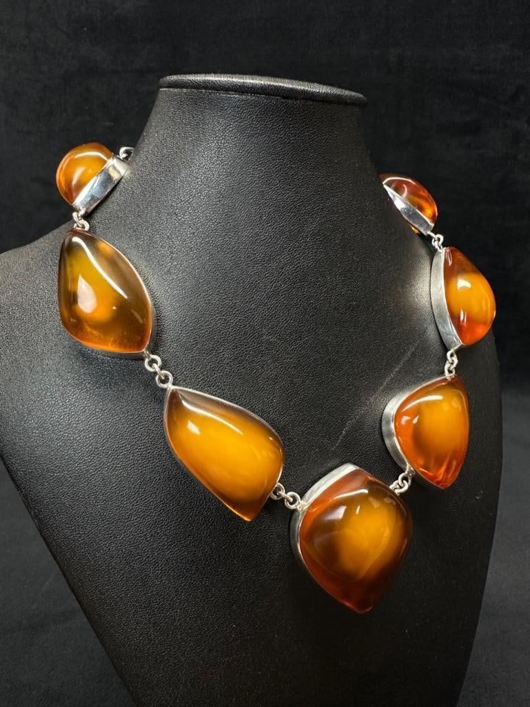Lot 475: Beautiful Clean Honey Amber Set in Sterling Silver