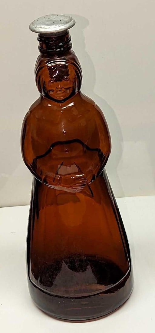Lot 497: Vintage Mrs Butterworth Amber Glass Sprinkle Bottle