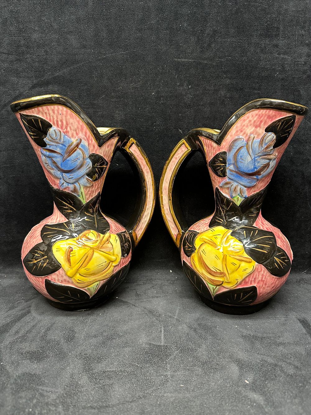 Lot 258: Pair Of Art Deco Style Floral Relief Pottery Pitchers