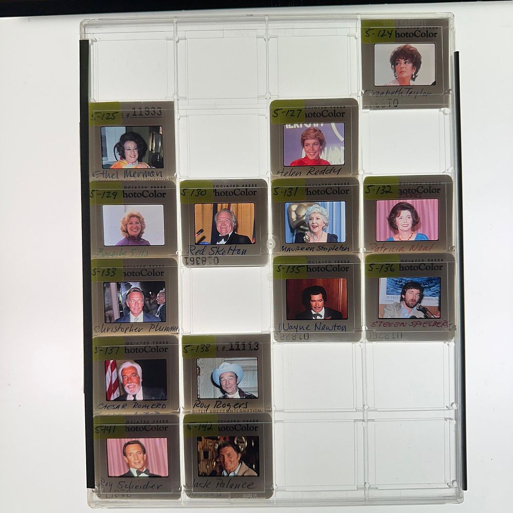 Lot 334: Collection of Celebrity and Entertainment Press Photo Slides Elizabeth Taylor Steven Spielberg