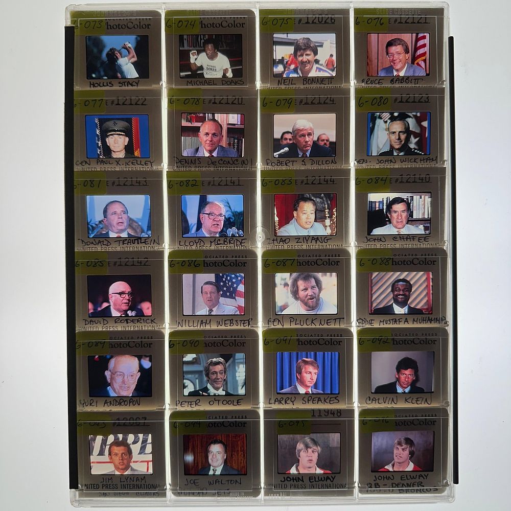 Lot 341: AP and UPI Press Photo Slides John Elway Calvin Klein Political Figures Sports Personalities