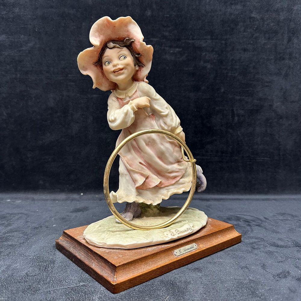 Lot 485: G. Armani Girl with Hoop Figural Sculpture Wooden Base