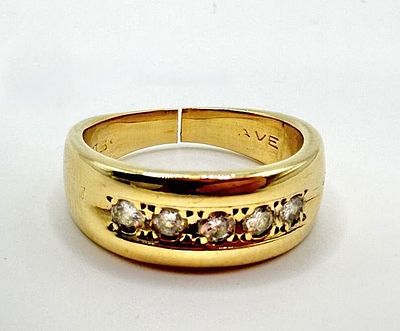 14k Gold 5-Stone Diamond Band. This piece of jewelry has been tested and researched prior to 