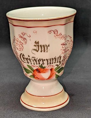 Vintage Porcelain German Cup. Has a saying on the side we cannot make out. This cup is approx 3 