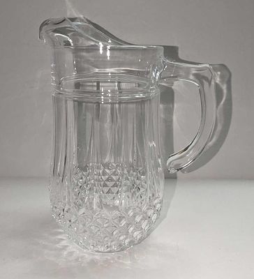 Vintage 9" Diamond Pattern Glass Pitcher. This is approx 7" x 5" x 9 3/8" and it weighs 2.83 