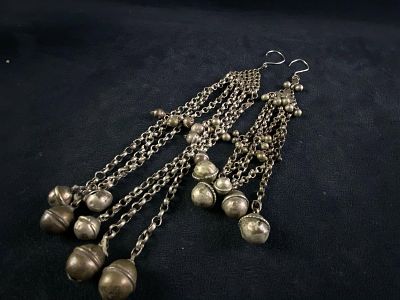 Vintage Traditionally Tribal Long Dangle Earrings. This fine piece of vintage Jewelry has been 