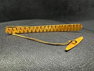 18k Gold Tie Bar. This piece of jewelry has been tested and researched prior to listing. Please 