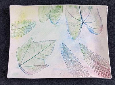 Handmade Decorative Plate This plate is made from white ball clay and has beautiful leaf 