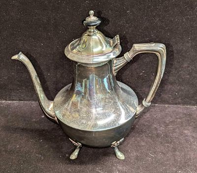 Vintage Crescent Silver Plate Tea Pot. This is approx 9 1/2" x 6" x 10" and it weighs 1.96lb. 