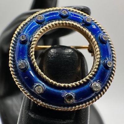 Crown Trifari Royal Blue Enameled Circle Rhinestone Accent Gold Tone Brooch. This vintage 