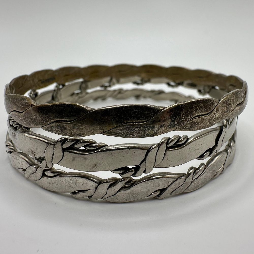 Lot 494: Mexico Silver Tone Twisted Rope Design Bangle Bracelets Three