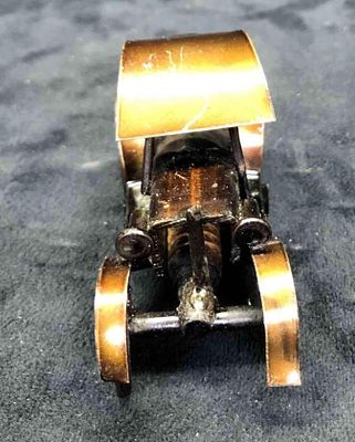 Handmade Metal & Recycled Spark Plug Miniature Vintage Car Sculpture. This lot contains a 