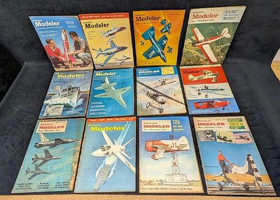12 1950's American Modeler Magazines. Each of the magazines is approx 8 3/8" x 1/8" x 11" and 
