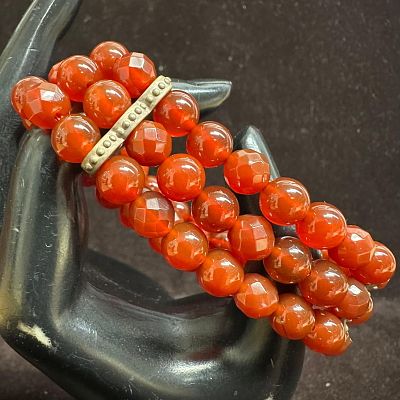 Triple Strand Faceted Carnelian Stone Bead Sterling Silver Bracelet. This item is in good 