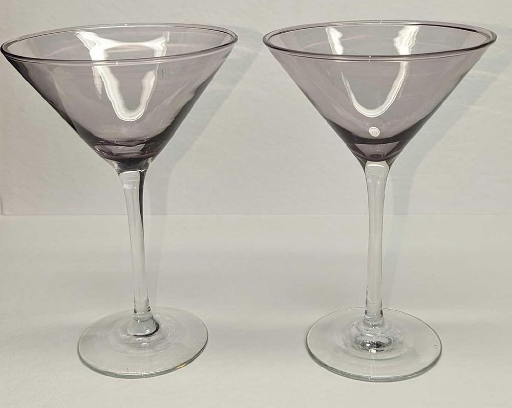 2 Vintage Glass Martini Glasses B. The maker and date of creation are unknown. Each glass is 