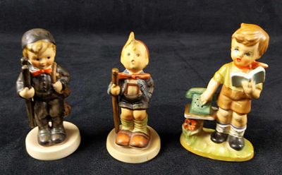 2 Vintage Goebel Hummel Figurines And 1 Imitation. This lot includes: (1) Chimney Sweep. 12 2/0 