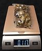 10 Plus Ounces of Gold Charms, Beads, Broken Costume Jewelry and More. This lot contains over 11 Image - 1