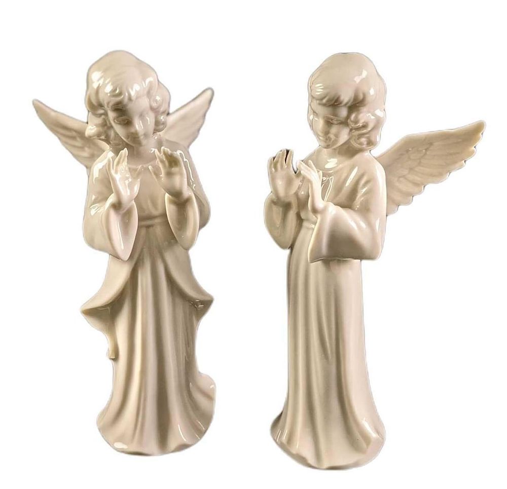Two Dresden Porcelain Angel Conductors. This lot includes two conductor angels by Dresden 