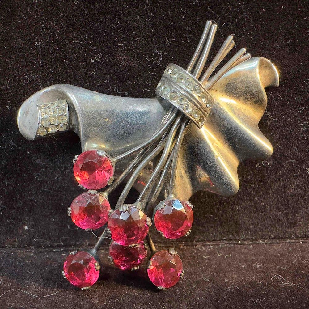 Lot 465: Sterling Silver Floral Brooch with Large Pink and Small Clear Rhinestones