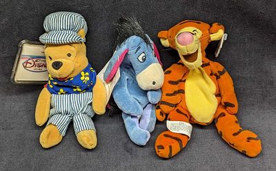 3 Disney Winnie The Pooh Bean Bag Dolls. This lot contains: 
(1) Eeyore Bean Bag Doll. This is 