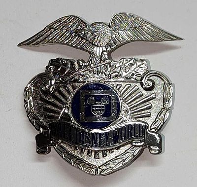 Early 1980s Disney World Security Badge. This is approx 2 1/2" x 1/4" x 2 1/2" and it weighs 