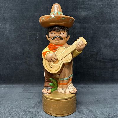 Hand Painted Ceramic Mariachi Musician Figurine with Guitar and Sombrero. Hand-painted ceramic 