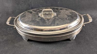 Stainless Steel Serving Dish with Glass Insert This is a Tramontina 18/10 Stainless Steel 