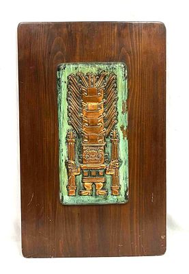 Copper Plaque With A Maya Totem Design Mounted On Dark Wooden Board. This lot contains a Copper 