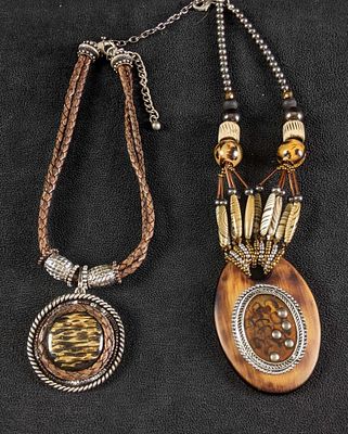 Earth Toned Necklaces With Large Pendants This lot comes with two necklaces One necklace is 