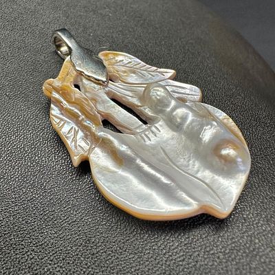 Hand-Carved Blister Pearl Pendant - Plant. This piece of jewelry has been tested and researched 