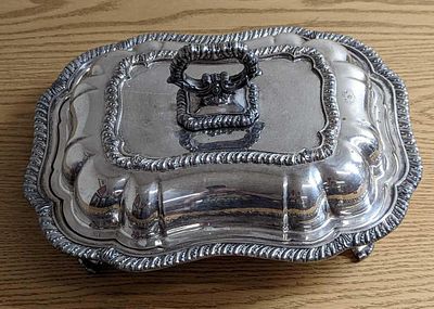 Vintage Silverplated Entree Dish. Is silverplate over copper. Is marked with two crowns on the 