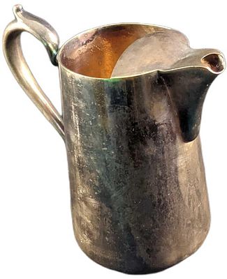 Vintage Silver Plated Water Pitcher. Is approx 9" x 5" x 9" and it weighs 2.55lbs. Is in a good, 
