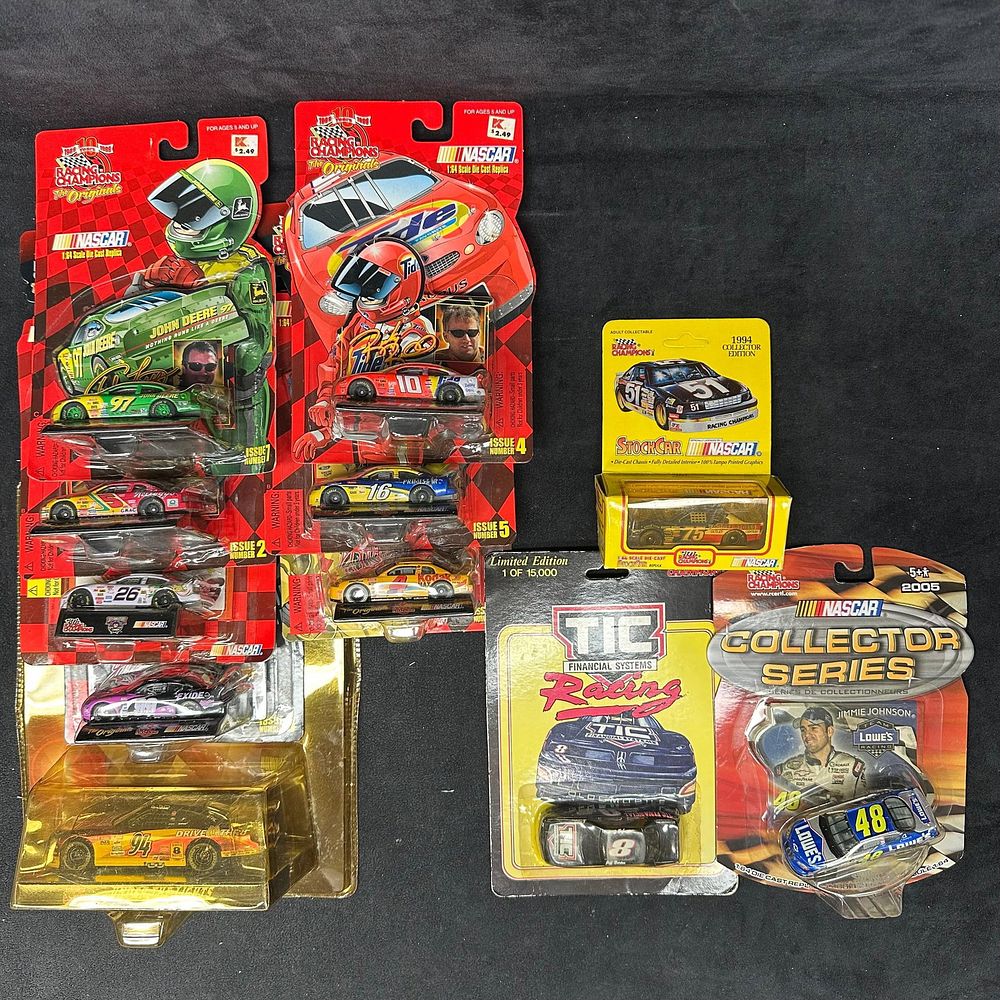 Lot 211: NASCAR Racing Champions Diecast Car Set with Jimmie Johnson Jeff Burton Ricky Rudd