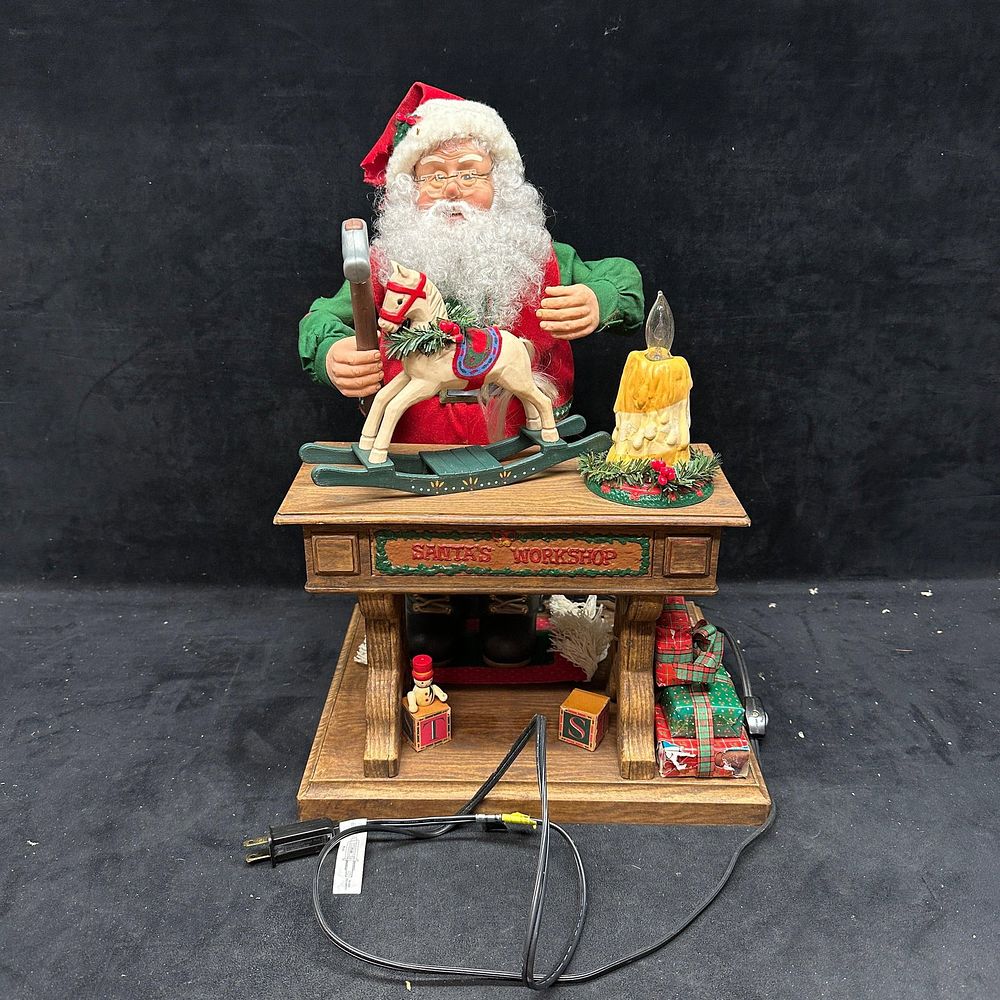 Lot 236: Animated Santa Workshop Christmas Display Figure with Lighted Candle