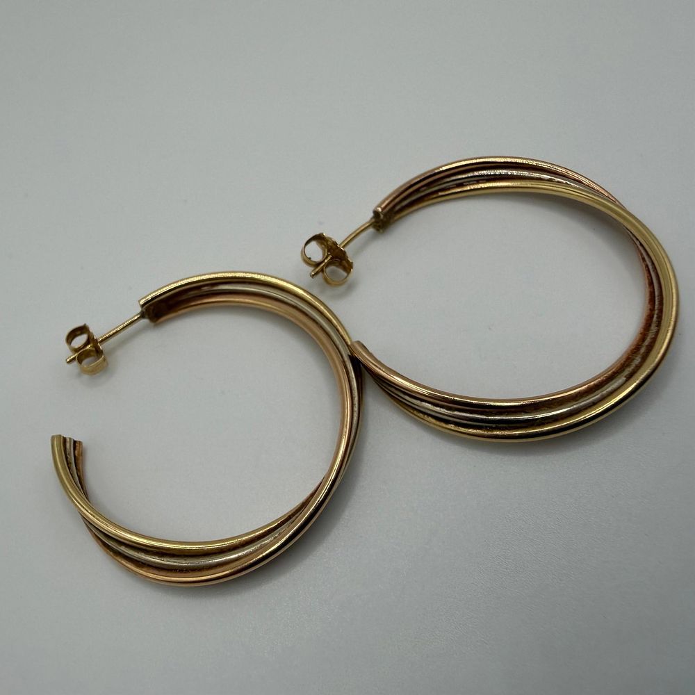 Lot 325: Tri Color 14K Gold Twisted Tube Design Earrings