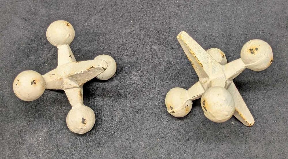 Lot 440: 2 Distressed White Vintage Cast Iron Jacks