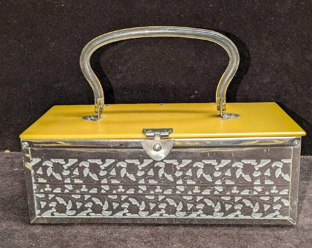 Lot 129: Vintage Metal Cutout Lucite Handle Jewelry Box
