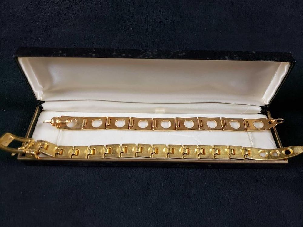 Lot 203: 2 Gold Colored Bracelets