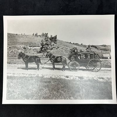 Black and White Analog Photograph Stagecoach with Horses. Black-and-white analog print depicting 