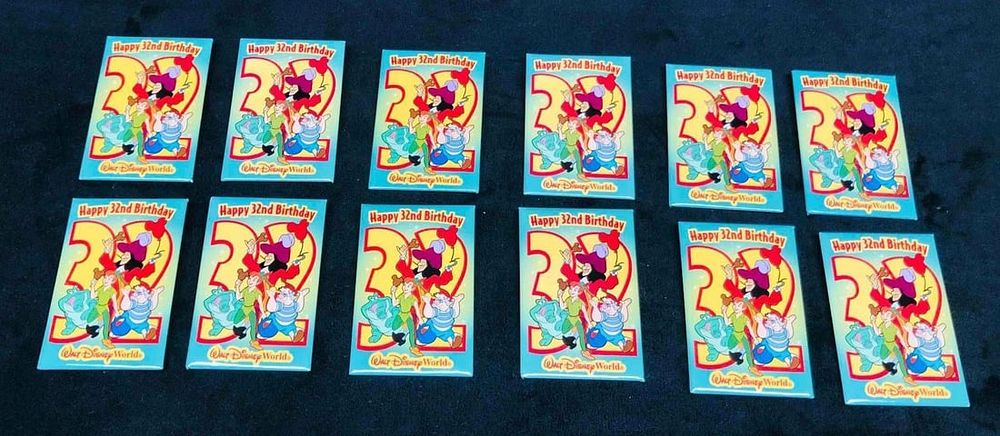 Lot 284: 12 "Happy 32nd Birthday" Walt Disney World Peter Pan Pins