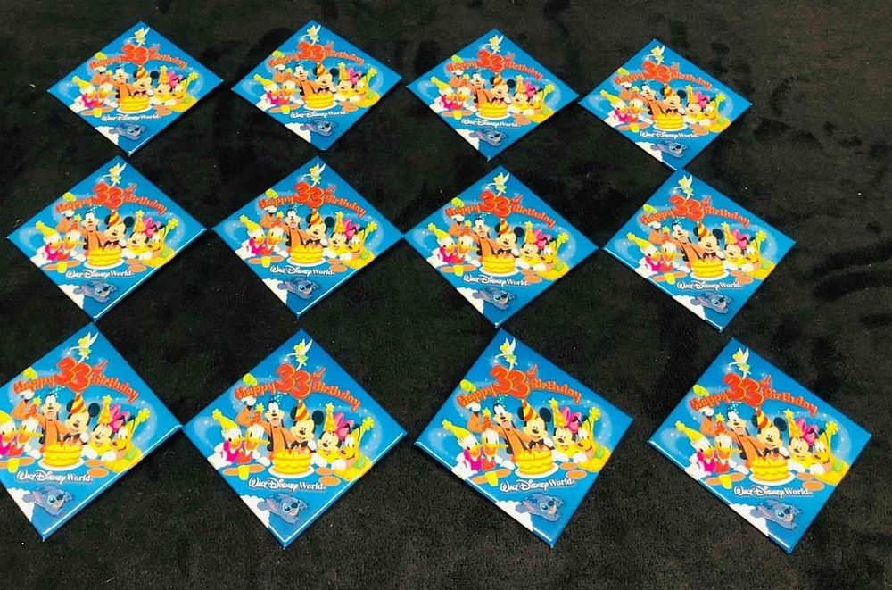 Lot 289: 12 "Happy 33rd Birthday" Walt Disney World Buttons