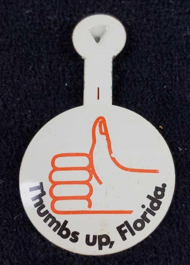Lot 469: 27 Vintage Thumbs Up Florida Tin Buttons