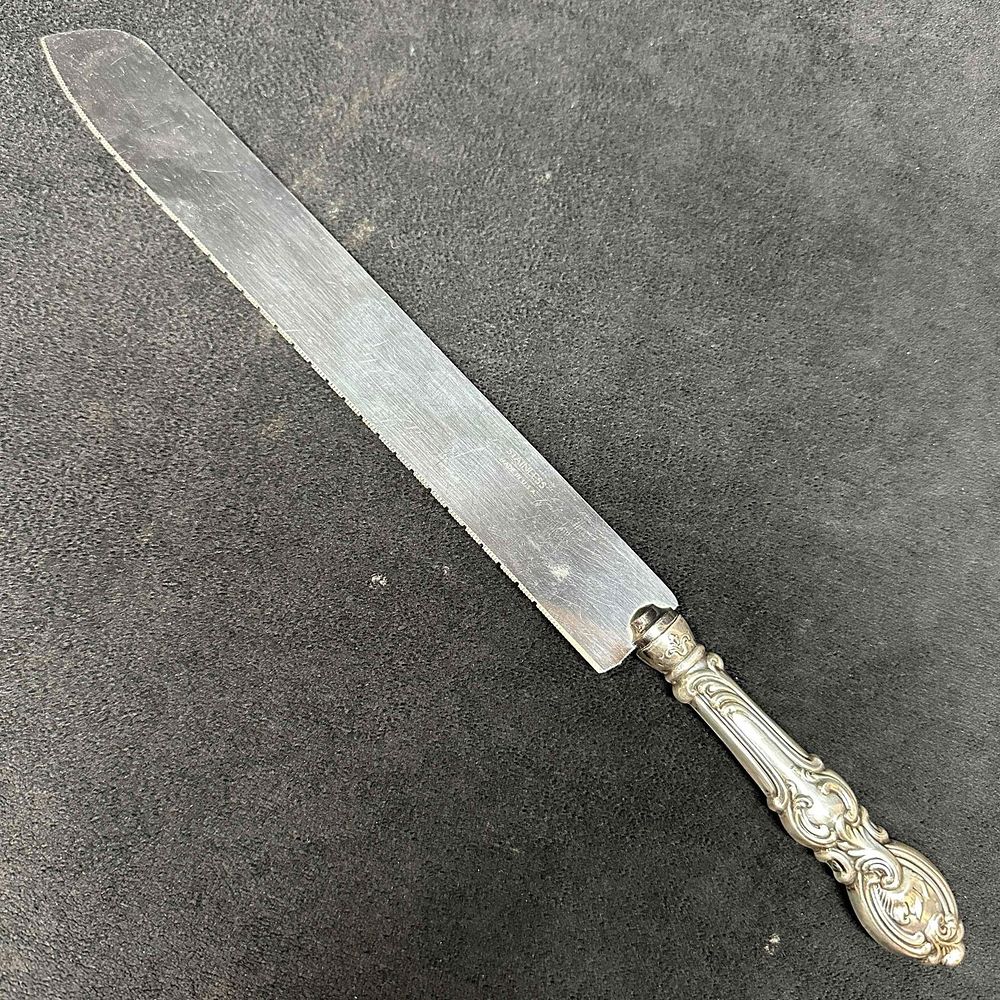 Lot 170: Sterling Silver Handled Stainless Steel Blade Flat Bread Knife
