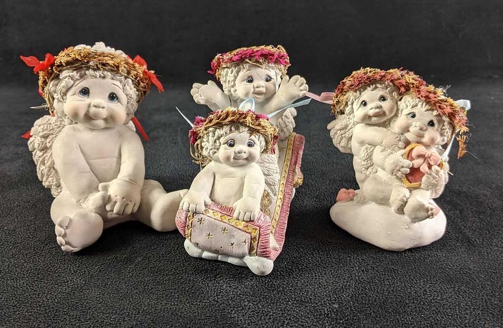 Lot 485: Three Dreamciles Baby Figurines (1) "Christmas Cutie" (2) "Share the Magic" (3) " All My Lovin"