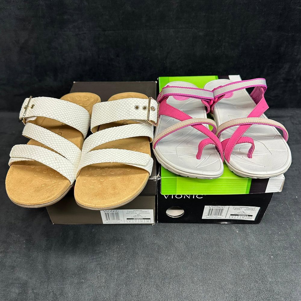 Lot 489: Vionic Women’s Sandals Lot 2 Pairs White Strappy Slide and Pink Gray Active Sandal